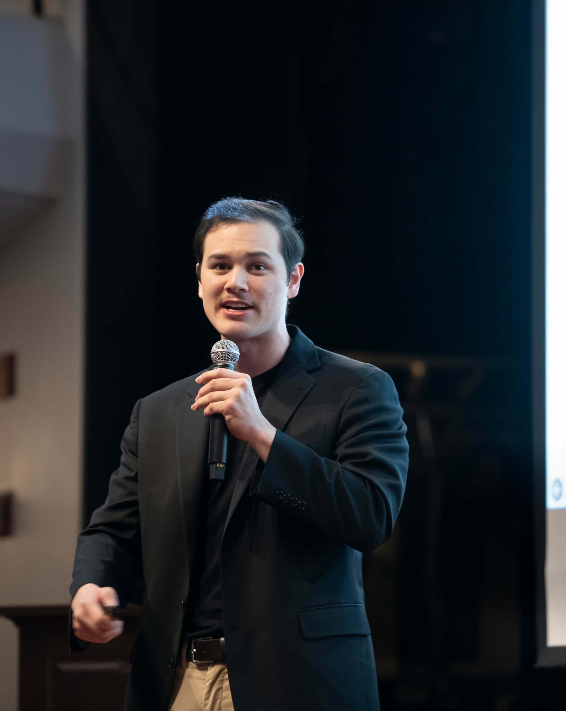 Philip speaking on stage